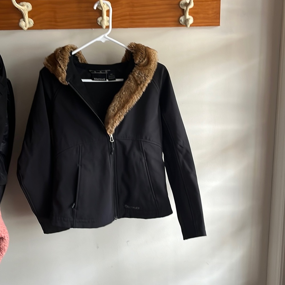 Marmot perfect light weight jacket. Size small. Black jacket with fur hood.